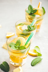 Homemade iced lemon sweet tea with mint