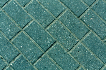 Cyan toned pavement surface