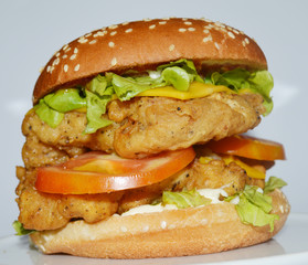 This is an amazing double Chicken and Cheese Burger, very tasty. Also known as Chicken Rounder.