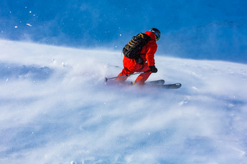Skiing in the snowy mountains, Carpathians, Ukraine, good winter day, ski season.