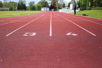 Athletic running track, sports, recreation, healthy life, sunny day