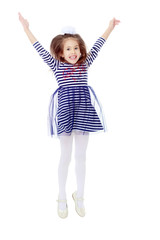 Little girl in a striped dress.