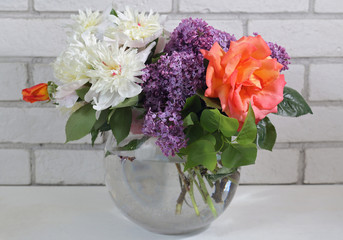 Beautiful flowers bouquet : peony, rose, lilac. Spring wedding decoration idea