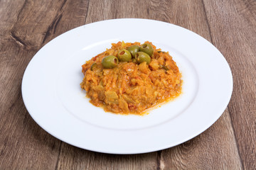 Vegetarian food on  plate with wooden background