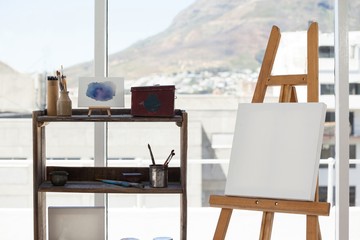 Easel with blank canvas