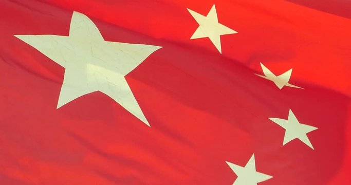4k Chinese flag flutters in wind.