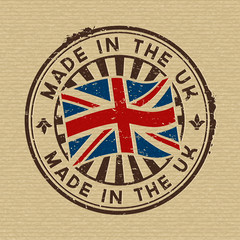 Made in the UK. Stamp on wooden background