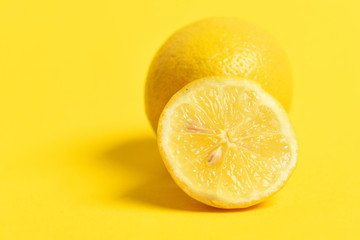 Lemon. lemon on yellow background, healthy fruit diet concept