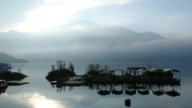 Floating boat island at the riverside of the Shui She Wharf at sunrise