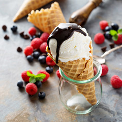 Vanilla ice cream scoop in a waffle cone