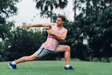 Man doing exercise in  a park