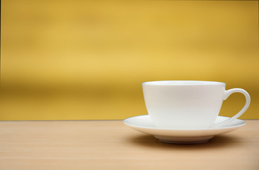 coffee cup on wood table, brown backgrounds