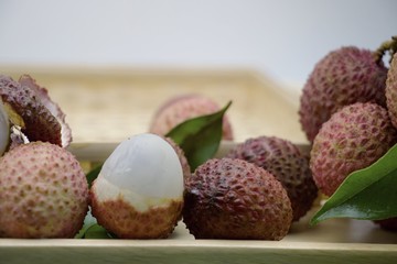 Lychee fruit on green grass