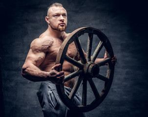 Portrait of shirtless muscular slave male.