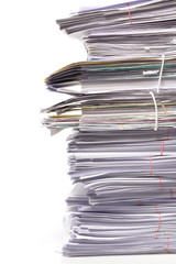 Stack of business papers isolated on white background