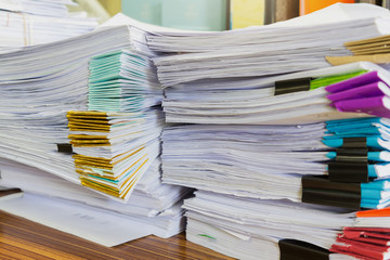 Pile of unfinished documents on office desk, Stack of business paper