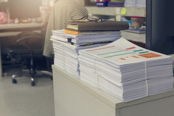 Pile of unfinished documents on office desk, Stack of business paper