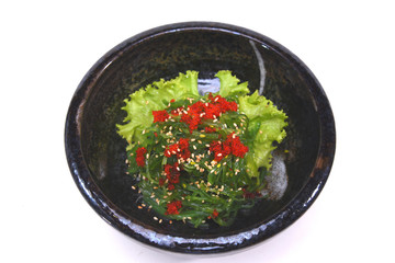 Hiyashi Wakame Chuka , Seaweed salad with sesame and tobiko isolated on white background (with Clipping path)