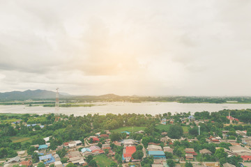 High view point for river and mountain and city with nimbus cloud.