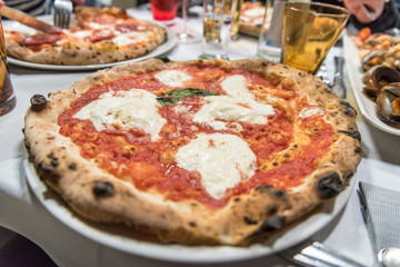 A typical italian pizza served in a restaurant