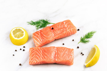 Photo of slices of salmon on white with copyspace