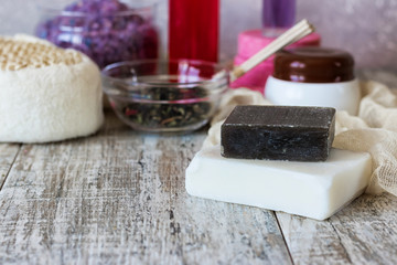 Spa items on a light wooden background