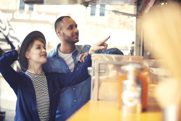 Young couple exploring new flavours