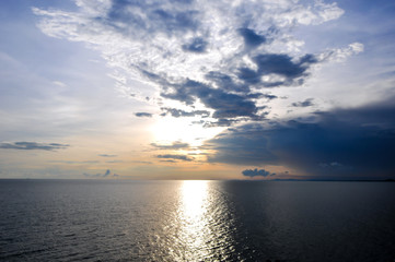 middle of the sea with beautiful sun set