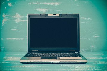 laptop keyboard, woman working on computer .