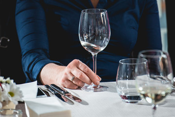 woman at the food and wine pairing going to try white wine