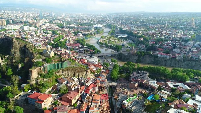 Aerial View. Flying over Tbilisi old city. 4K, UHD