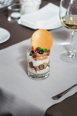 creamy dessert with strawberry at the food and wine pairing evening the expensive restaurant. close view