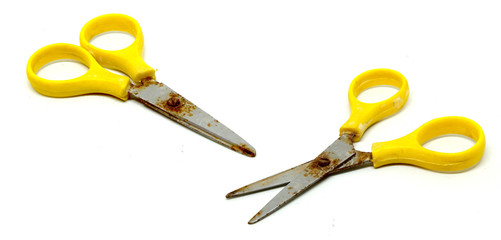 old rusty scissors isolated on white background.