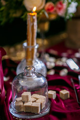 Served table with bouquet and candles