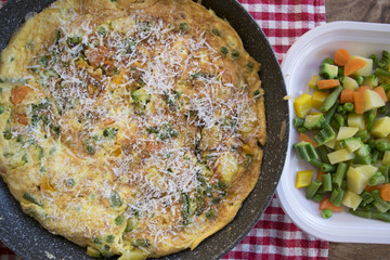omelette with cube vegetables and parmesan cheese