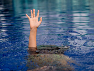 Drowning victims, Hand of drowning man needing help. Failure and rescue concept.