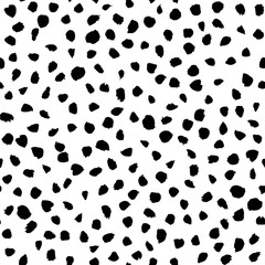 Artistic hand drawn seamless ink pattern. Black and white brush strokes - dots and spots. Repeatable doodle sketch design for print, textile, wrapping paper, invitation card background, fashion fabric