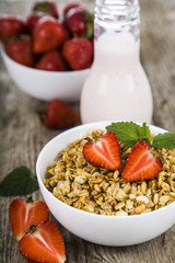 Granola and smoothies with strawberry