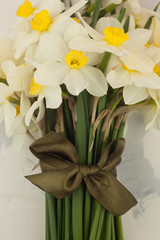 Fresh spring narcissus or daffodil flowers Collected in a bouquet, spring romantic concept