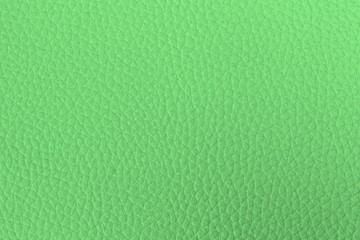 Bright green leather texture be used as background