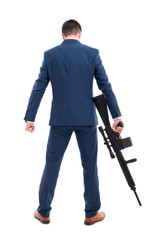 Fototapeta na wymiar Back view of accountant armed with a rifle