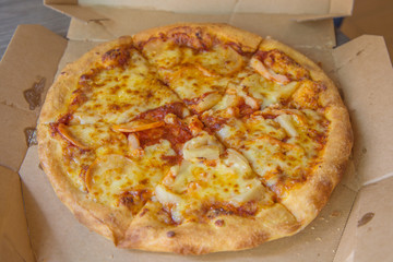 Pizza in the open boxes for ready to eat.