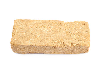 Briquette of nut halva confection isolated
