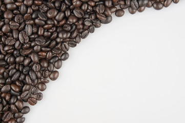 Roasted coffee beans have space on right use as background