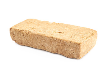 Briquette of nut halva confection isolated