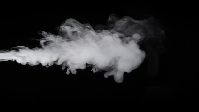 Smoke steam on black background in slow motion.

