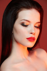 beauty make up girl over red background