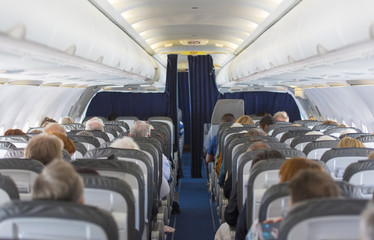 Aircraft cabin with passengers