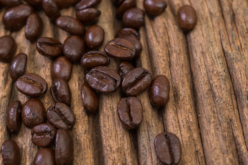 Roasted coffee bean on wood background