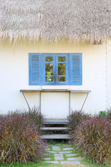 Wooden window of country house.